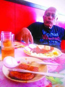 old Goan resident currently living in Koramangala enjoying his beer Capt Oscar at Goan restaurant city kemp